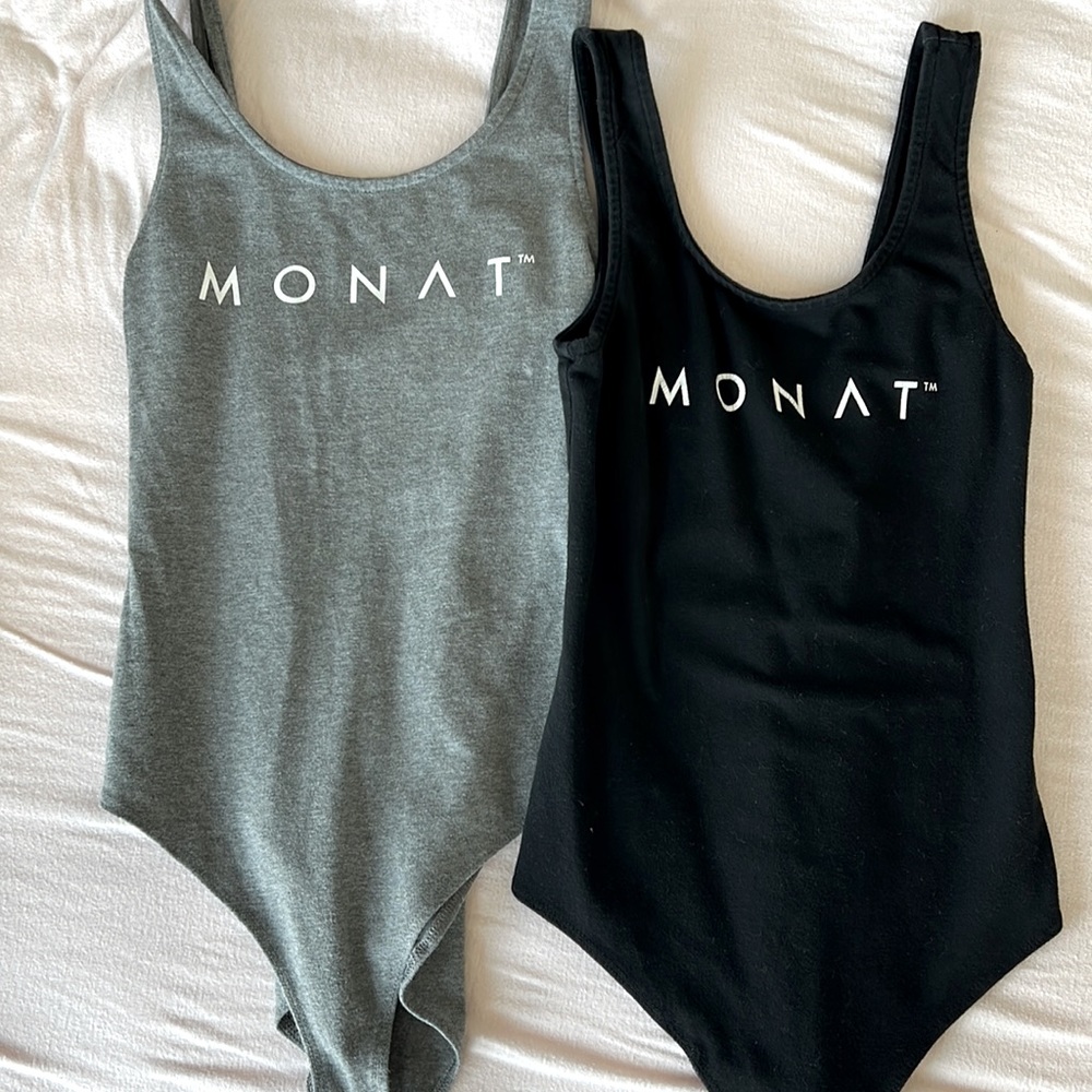 2 gently used MONAT cotton bodysuits size small